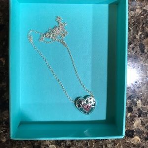 Sterling silver and pink sapphire heart necklace.